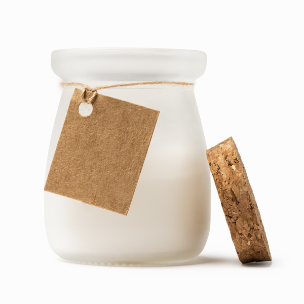 Vela AROMA con tapa de corcho retirada y etiqueta kraft
